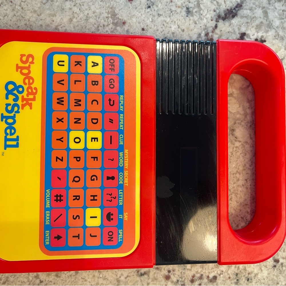 Texas Instruments Speak & Spell Learning Toy - Red, Yellow, Blue